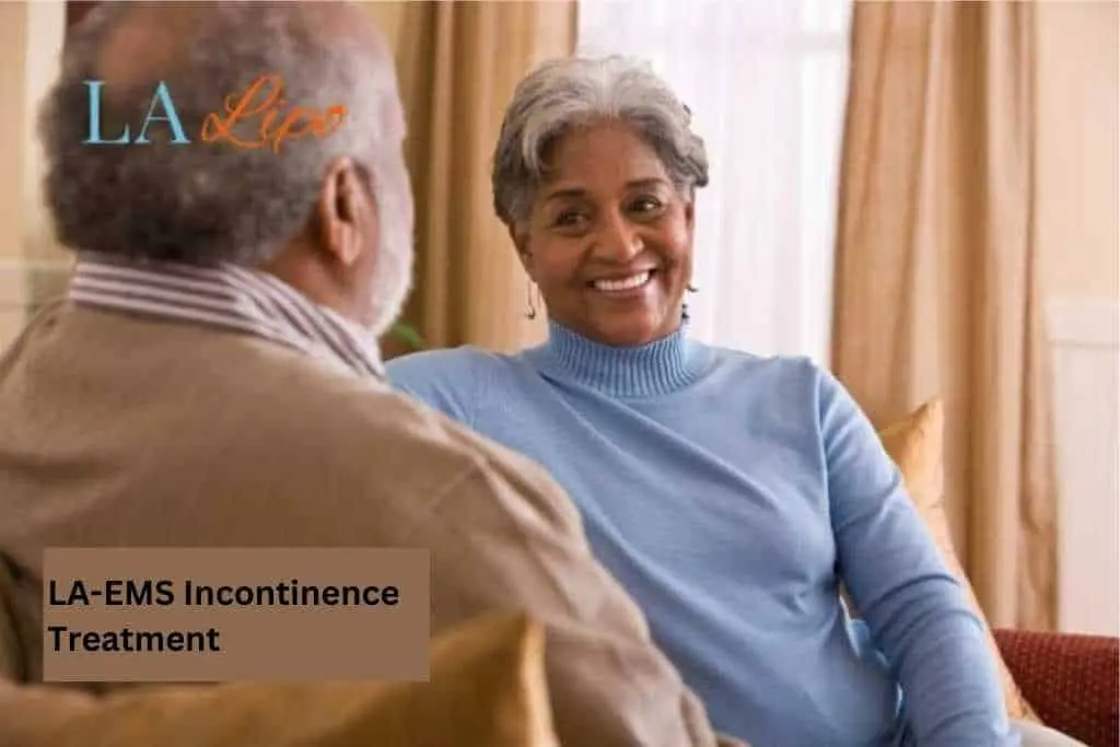 Couple sat smiling at each other - LA-EMS treatment Rushden